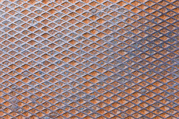 Anti slip metal shape texture. Orange rust iron background.