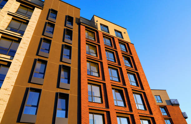 istock Modern facade building on blue sky. Skyscraper facade. Modern High rise residential facade. 2174448761