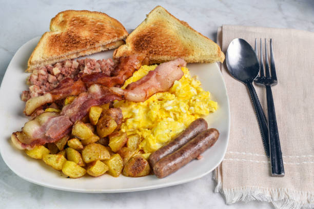 istock scramble ess with  home fries and corn beef hash 2174449478