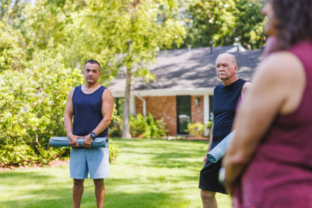 istock Diverse Participants Ready for Outdoor Yoga Class 2174450919