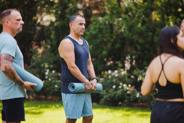 istock Diverse Group Prepares for Yoga in Rehabilitation Program 2174450921