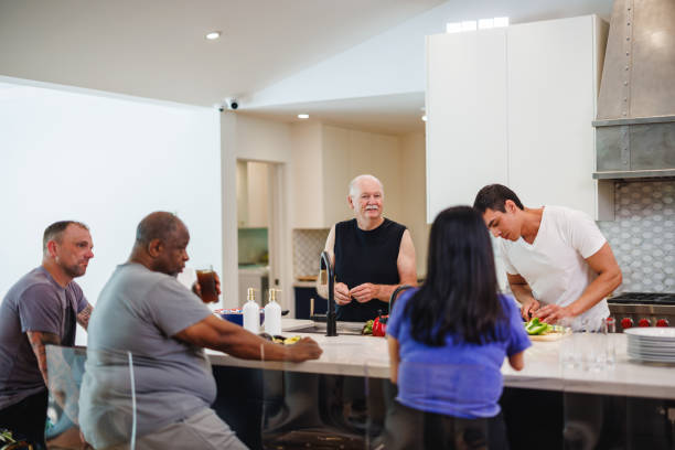 istock Group Activity in Kitchen at Rehabilitation Center 2174451085