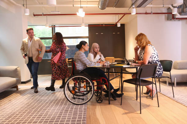istock Coworkers having meeting in modern office 2174451336