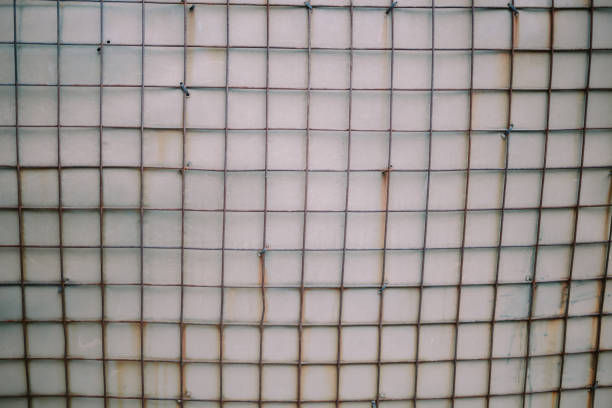 Wire mesh fence with a vibrant viber coating, serving as a sight barrier