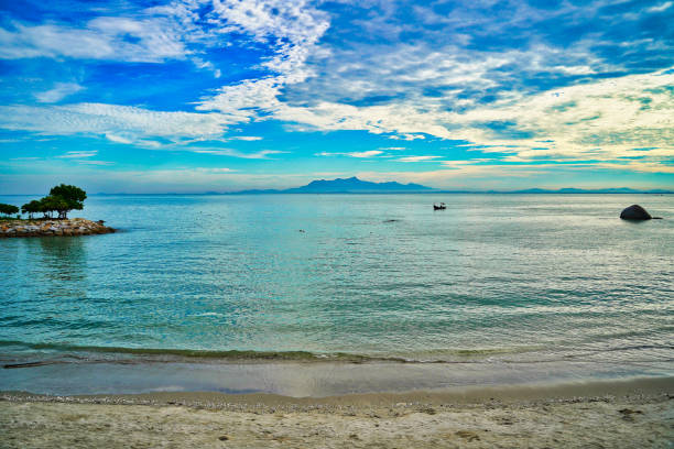 Morning sea views and calm over the stunning coast of Penang seen from Penang Beach towards the Malaysian mainland in George Town,Penang,Malaysia