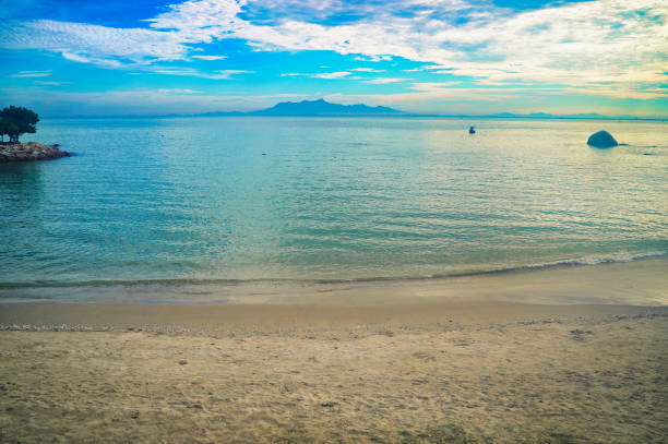 Early morning sunrise sea views of the Malaysia mainland as seen from Penang beach near Hotel mercure in George Town,Penang,Malaysia