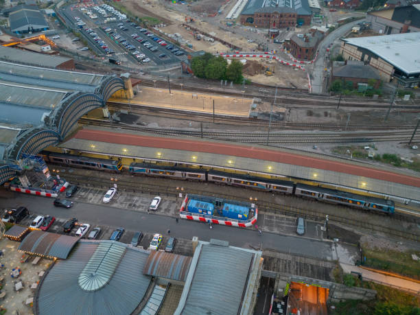 istock Historic York Railway Station with train at dusk aerial 2174456286