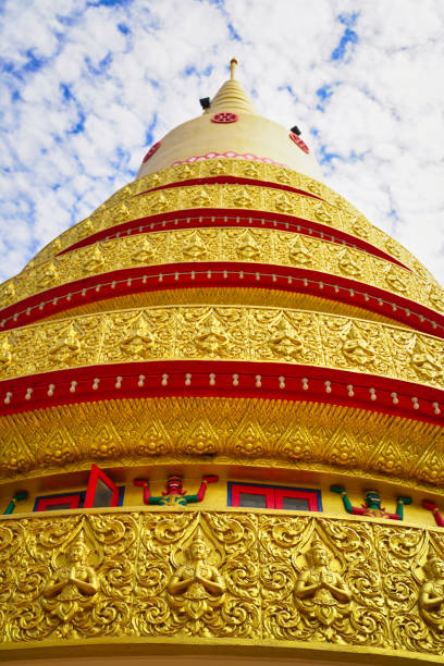 The gilded structure of the main stupa adorned with divine beings,devas at the Wat Chaiyamangkalaram Thai Theravada Buddhist temple built in 1845 in George Town,Penang,Malaysia