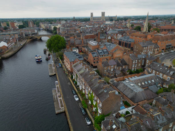 istock River Ouse riverfront in York with pier aerial city view 2174456308