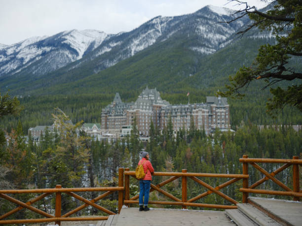 Serene woman looking from Surprise corner viewpoint in Banff
