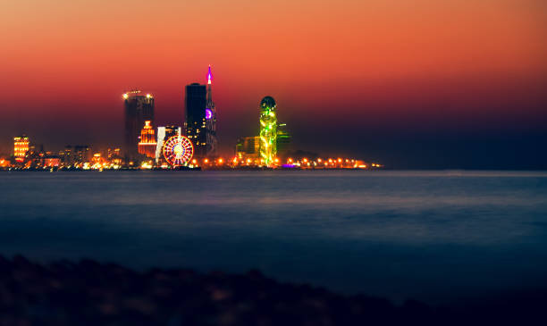 istock Stunning beautiful Batumi waterfront in Adjara, Georgia. Modern Architecture In Seafront Promenade In Night Or Evening Illuminations, Illuminated Resort Town Cityscape Skyscrapers 2174457942