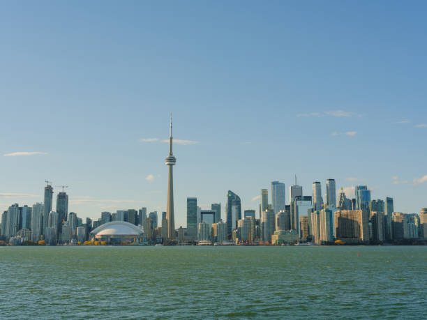 Toronto's CBD, seen across the water with a stormy, overcast sky.