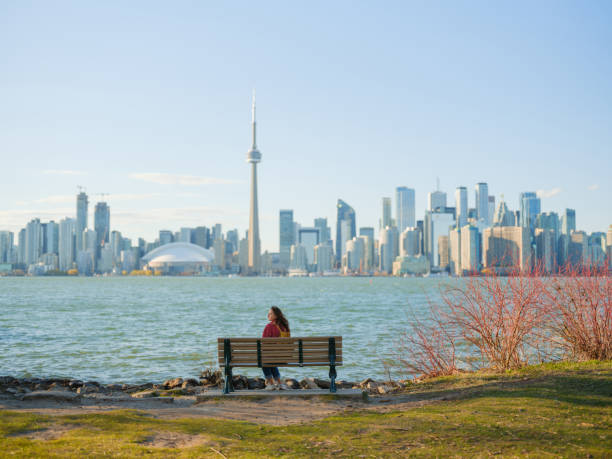 istock Woman looking at cityscape from Toronto Island 2174457983
