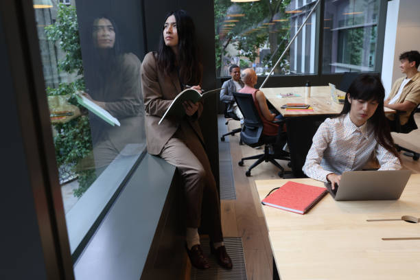 istock Group of business people in office 2174458205