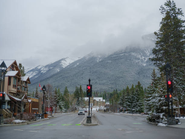 Empty Banff town without  tourist  off-season  with snowcapped mountain in the distance