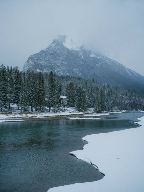 Scenic view of Bow River in winter in Banff town covered with snow