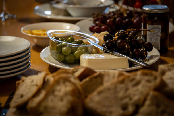 istock Olives and bread on a table for a party, with a shallow depth of field 2174459569