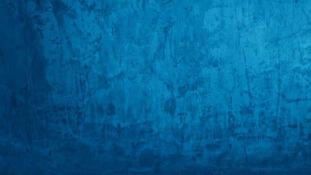 istock beautiful blue grunge stucco concrete texture use as background with blank space for design. artistic blue color cement wall background with light from above. 2174462024
