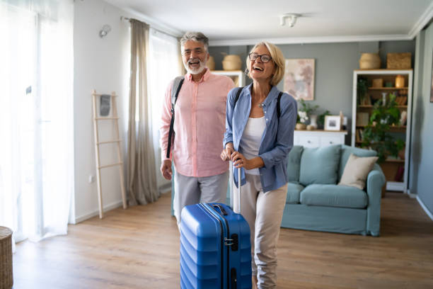 istock A Happy Senior Couple With Suitcase 2174465291