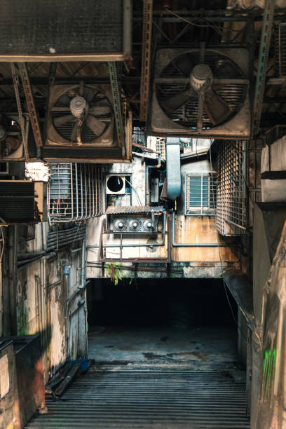 istock Exploring Taipei's Dimly Lit Alley With Industrial Features and Urban Infrastructure 2174466963