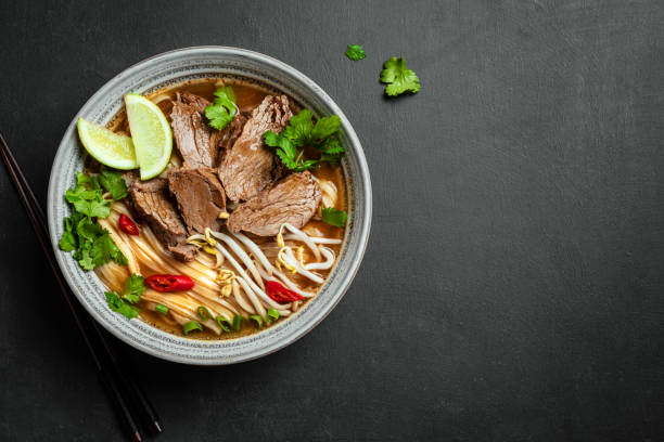istock Pho Bo Vietnamese soup with rice noodle and beef 2174468302