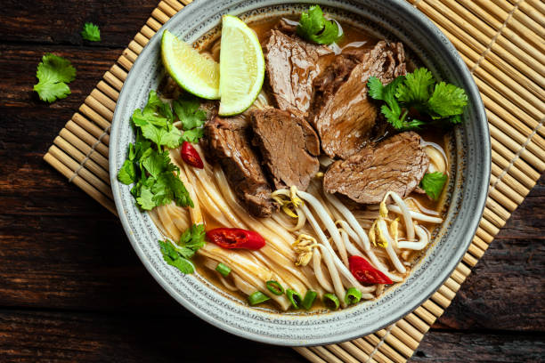istock Pho Bo Vietnamese soup with rice noodle and beef 2174468375