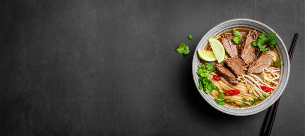 istock Pho Bo Vietnamese soup with rice noodle and beef 2174468453