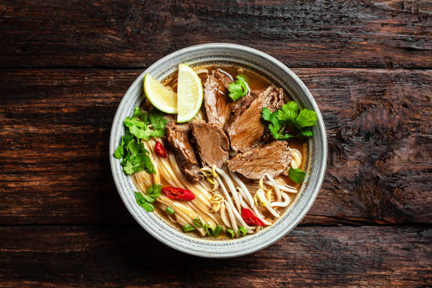 istock Pho Bo Vietnamese soup with rice noodle and beef 2174468979