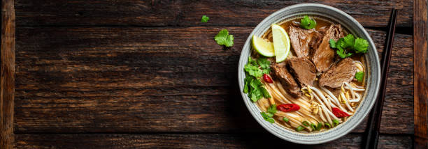 istock Pho Bo Vietnamese soup with rice noodle and beef 2174468983