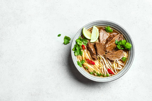 istock Pho Bo Vietnamese soup with rice noodle and beef 2174469098