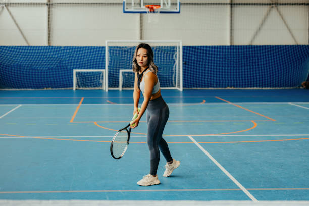 istock Focused athlete playing tennis on court 2174469110