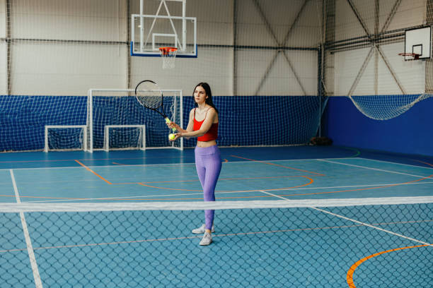 istock Woman practicing backhand stroke in tennis 2174470008