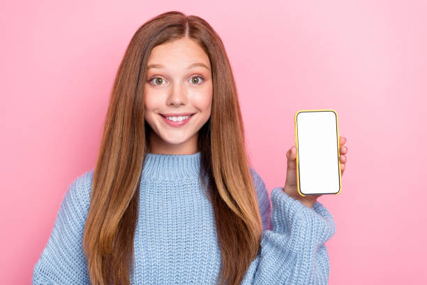 istock Photo of positive lady user show modern device new version application qr code click download empty space isolated on pink color background 2174478069