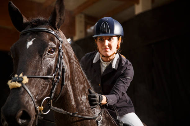 istock Woman riding a horse 2174479181