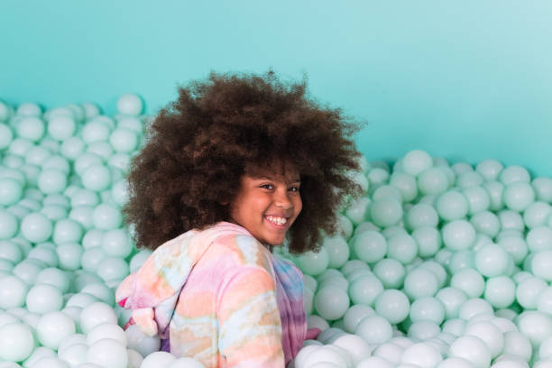 istock Cheerful child in ball pit 2174480866