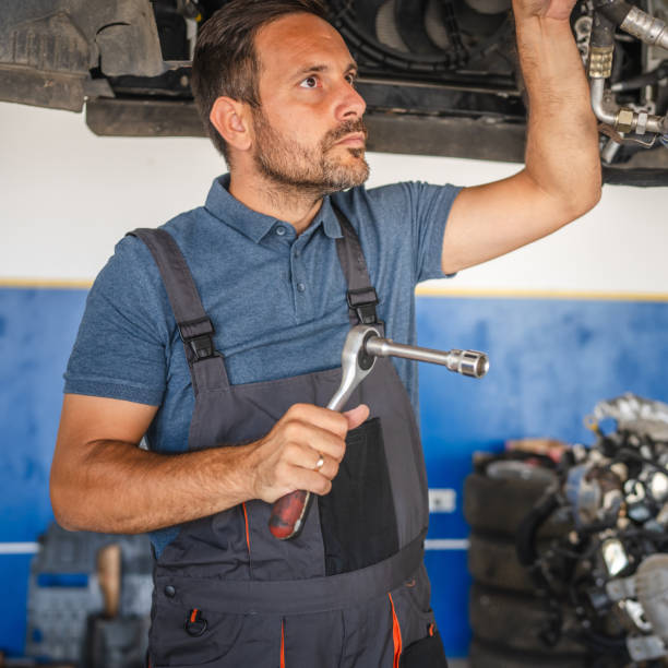 istock Car mechanic work and analysis on car engine with tools in a repair shop 2174483112