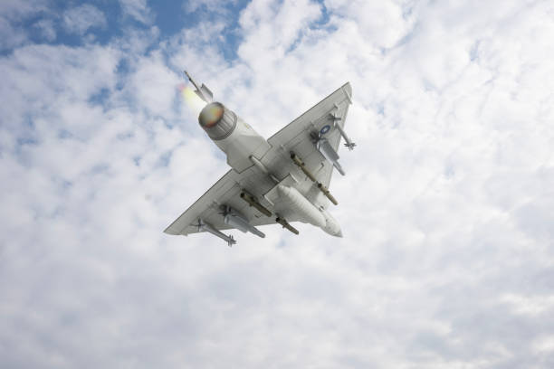 istock Jet aircrafts flying over the clouds. 2174485371
