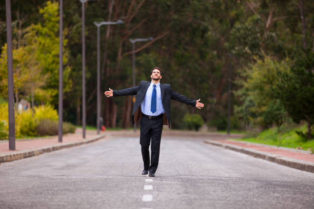 istock Businessman walking on the road line 2174486475