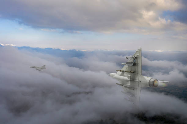 istock Jet aircrafts flying over the clouds. 2174486683