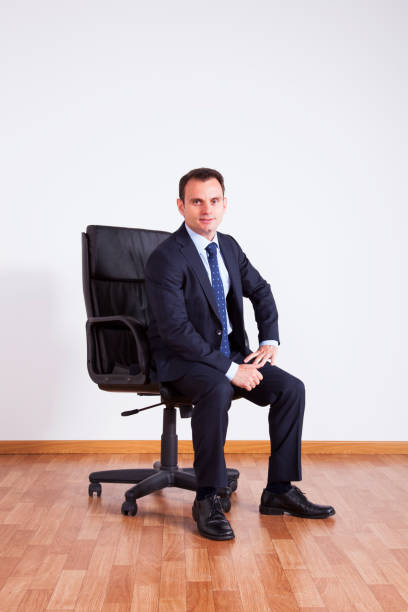 istock Businessman sit at his office chair 2174486970