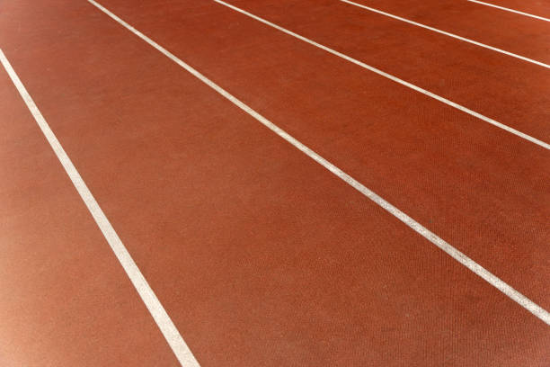 Run track stadium background. Start sport playground surface. High quality photo