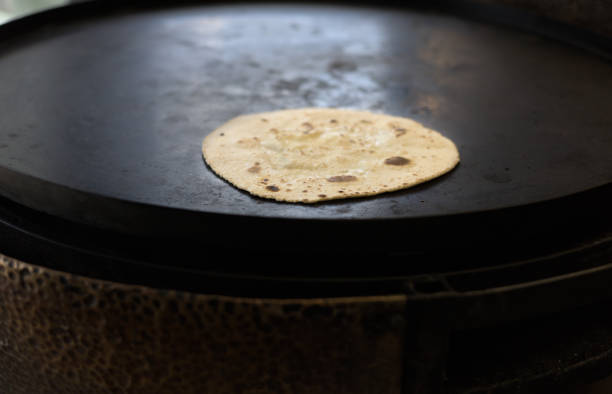 istock Pita bread cooking on flat iron pan 2174488760