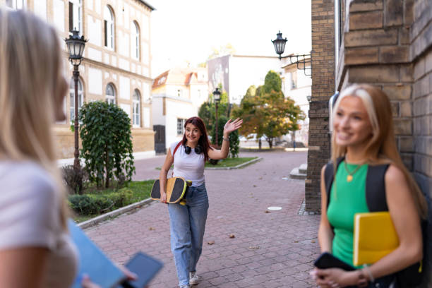 istock Three friends walking together on a sunny day. 2174493510