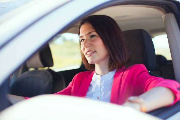 istock a woman confidently navigates the road 2174502399