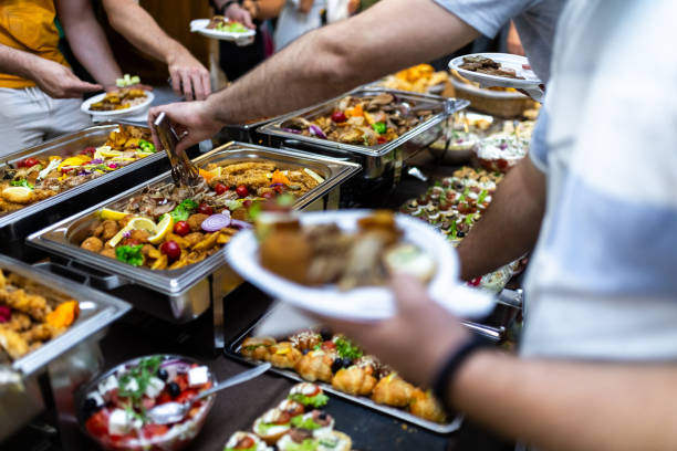 istock Catering spread featuring assorted dishes at a festive gathering in an indoor setting during a social event 2174502763