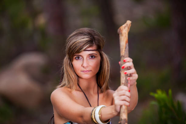 istock Beauty young woman with a stick 2174503273
