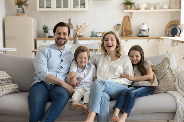 istock Friendly family posing for camera at home 2174506343