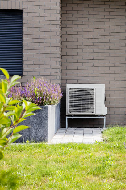 istock Air conditioner unit on modern building wall 2174513136