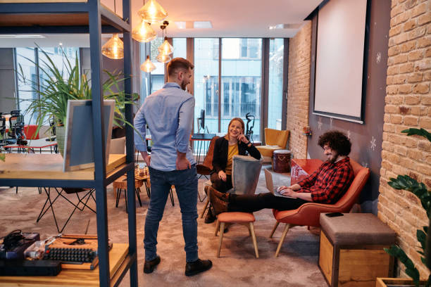 istock Office Colleagues Enjoying Break Time Together. 2174516437