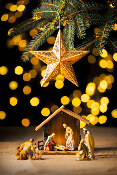 istock Nativity Scene With Big StsrUnder Christmas Tree 2174525582